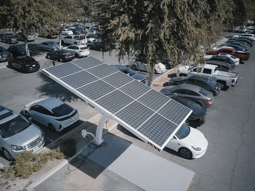 A person plugging an electric car with a charging cable, symbolizing extending the range of an electric car