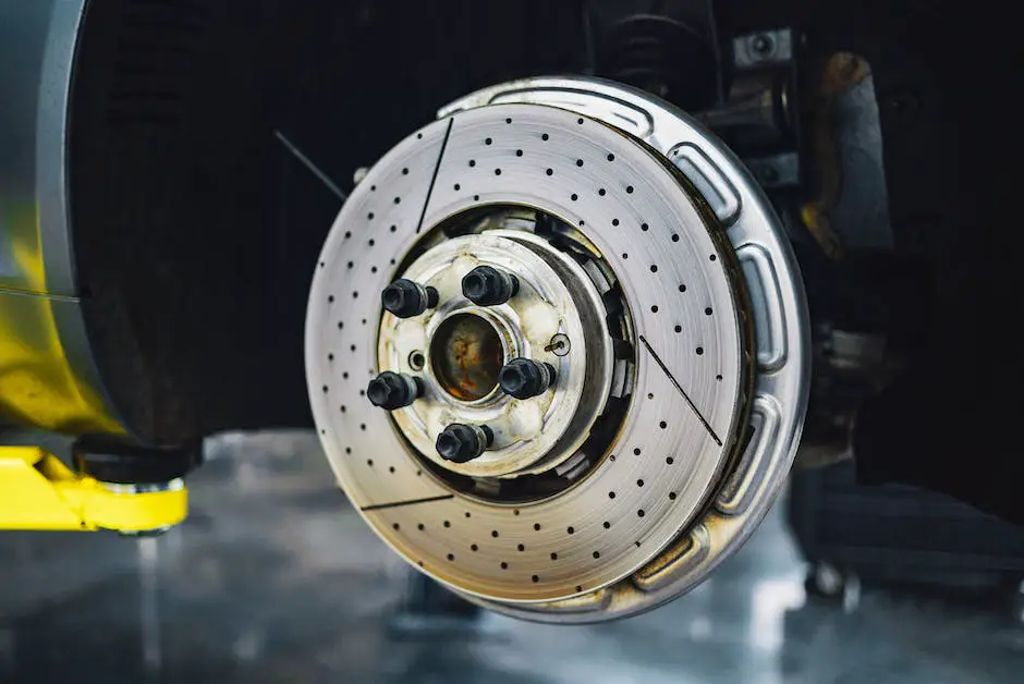 A motorcycle brake bleeder tool being used to bleed the brake system on a motorcycle.